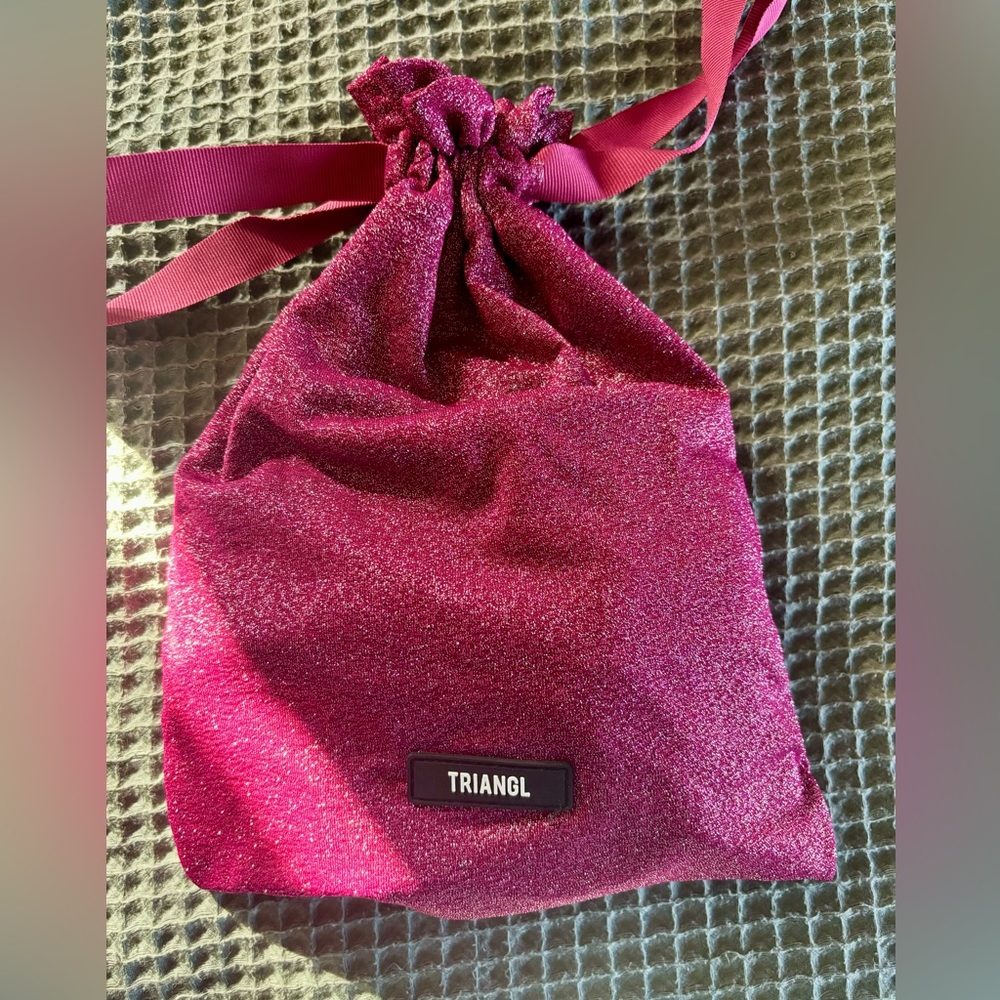 Brand New Triangl Bikini top and bottom Top (size small) Bottoms (size large)